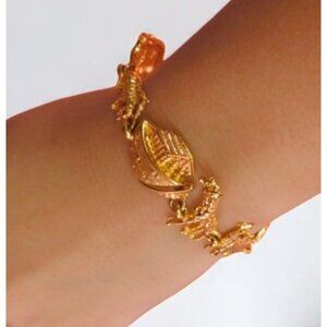 Noahs Ark Gold-Tone Charm Bracelet With Animal Design & Clasp Closure